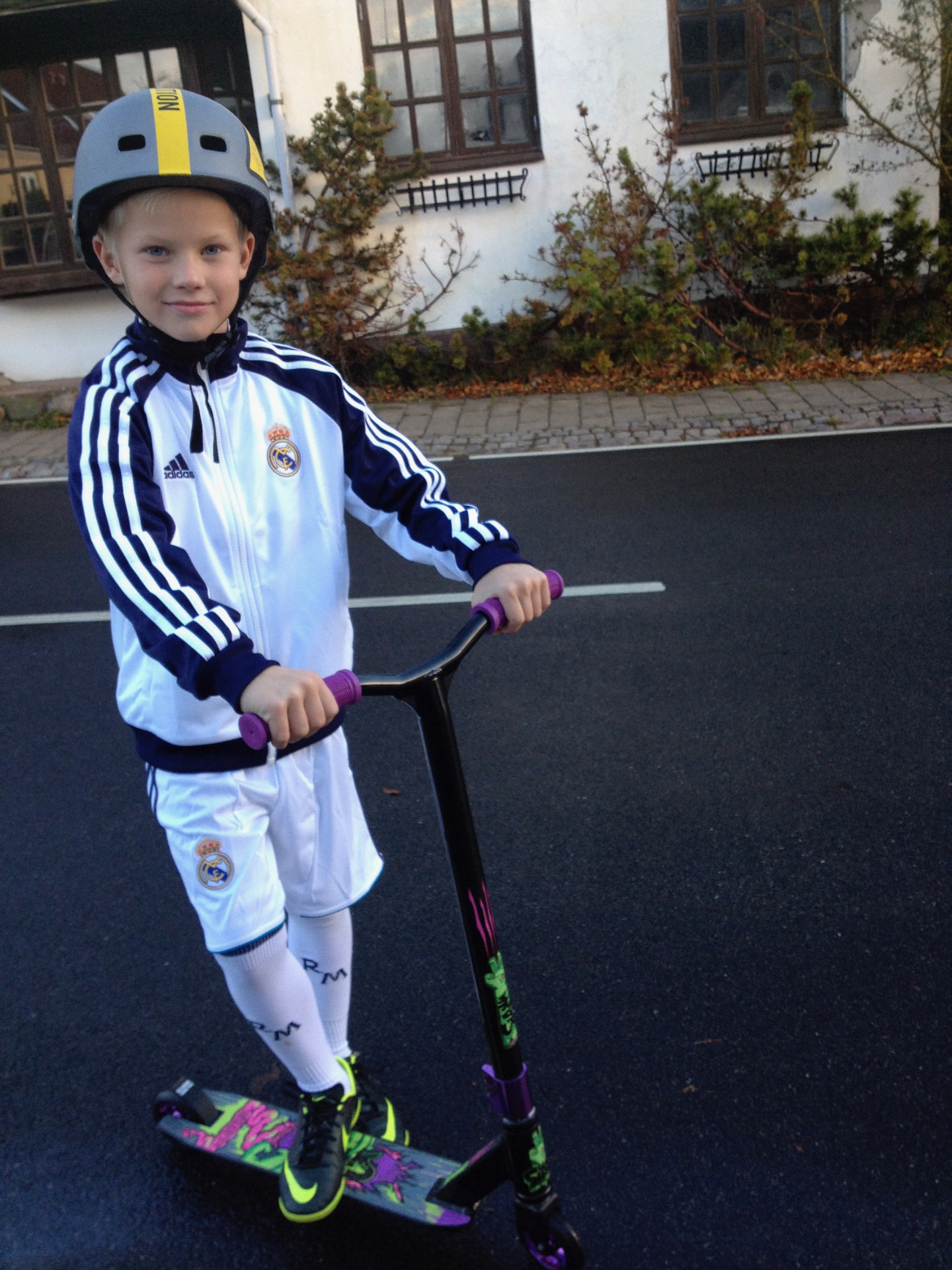 Hjalte as a kid with his first scooter